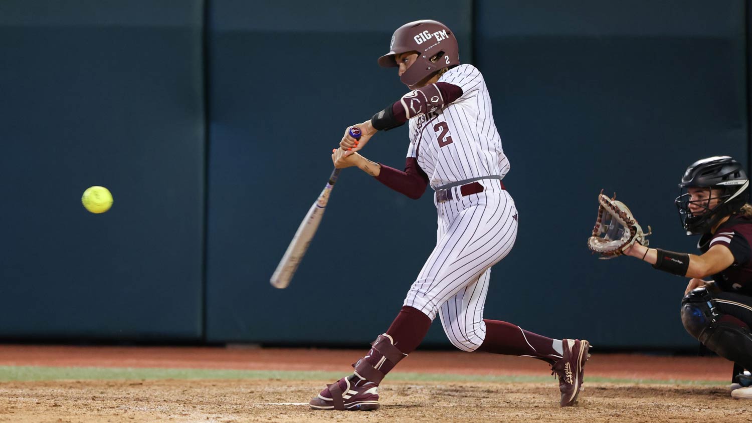 A Texas A&M softball player at bat