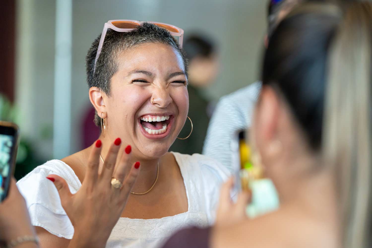 An aggie smiles after putting on their Aggie ring for the first time